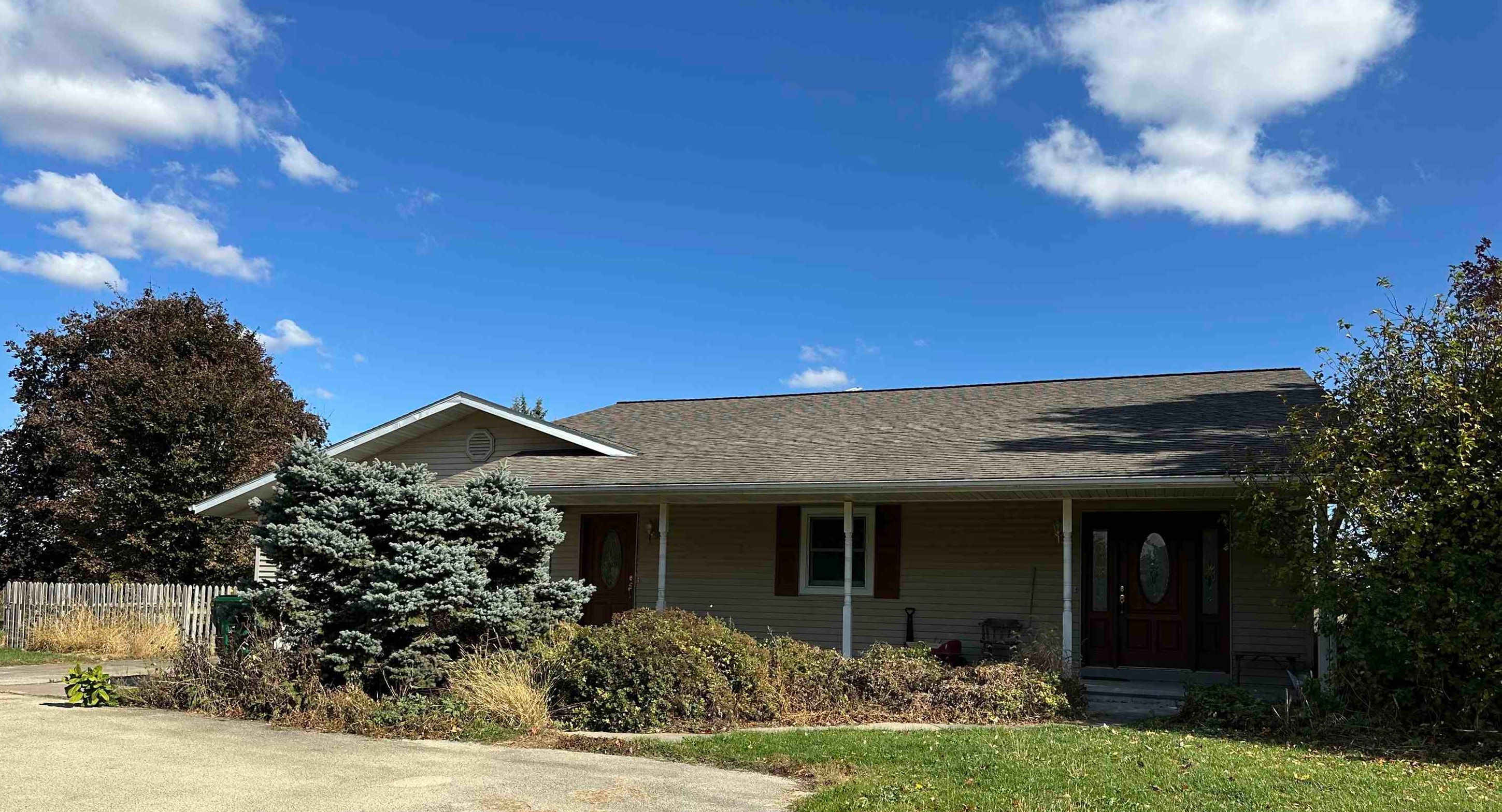 16529 Scenic Palisades Road Mount Carroll, IL 61053 - Photo 1 of 39 a view of a house with garden and plants
