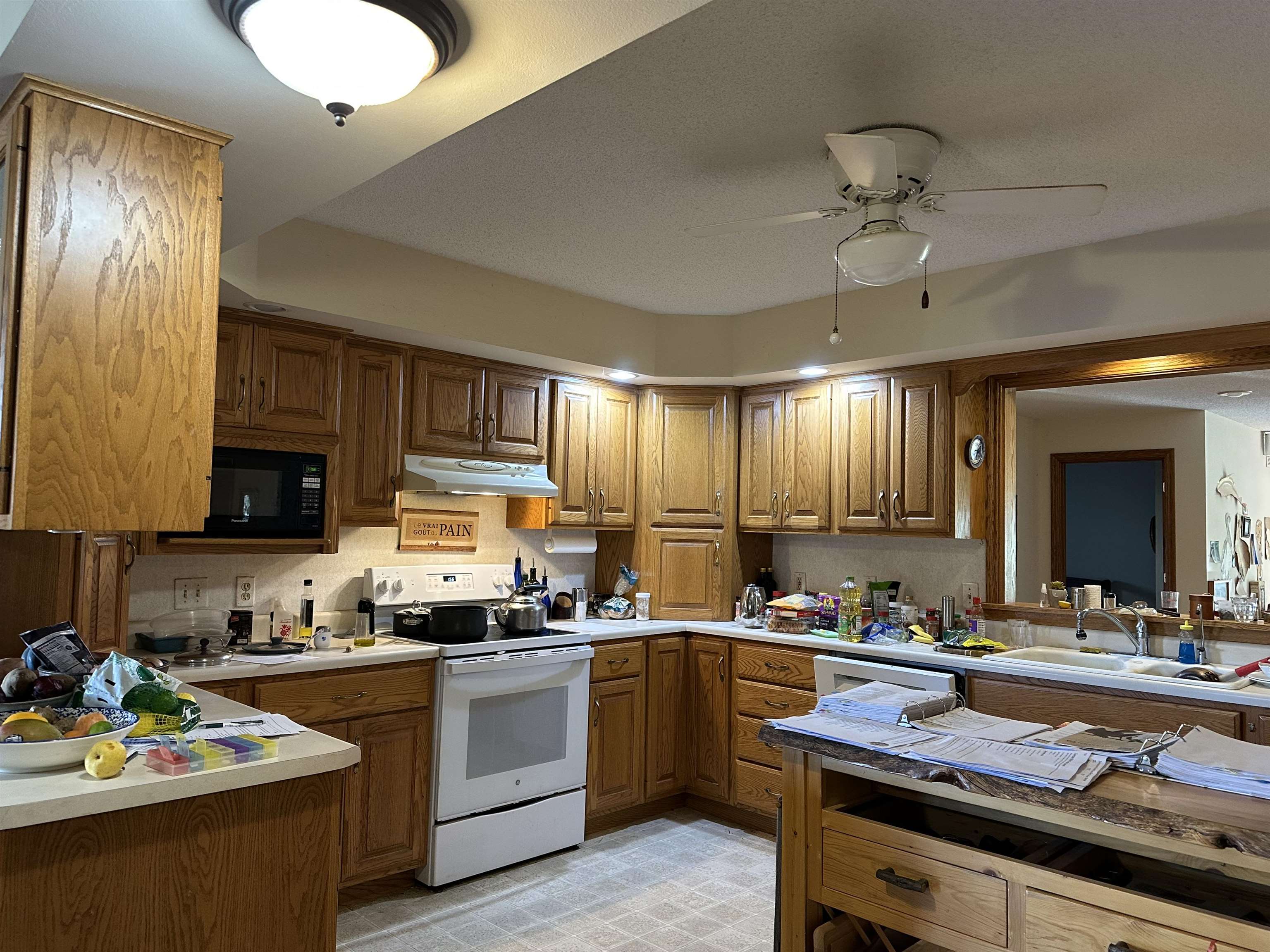 16529 Scenic Palisades Road Mount Carroll, IL 61053 - Photo 11 of 39 a kitchen with a sink stove and cabinets