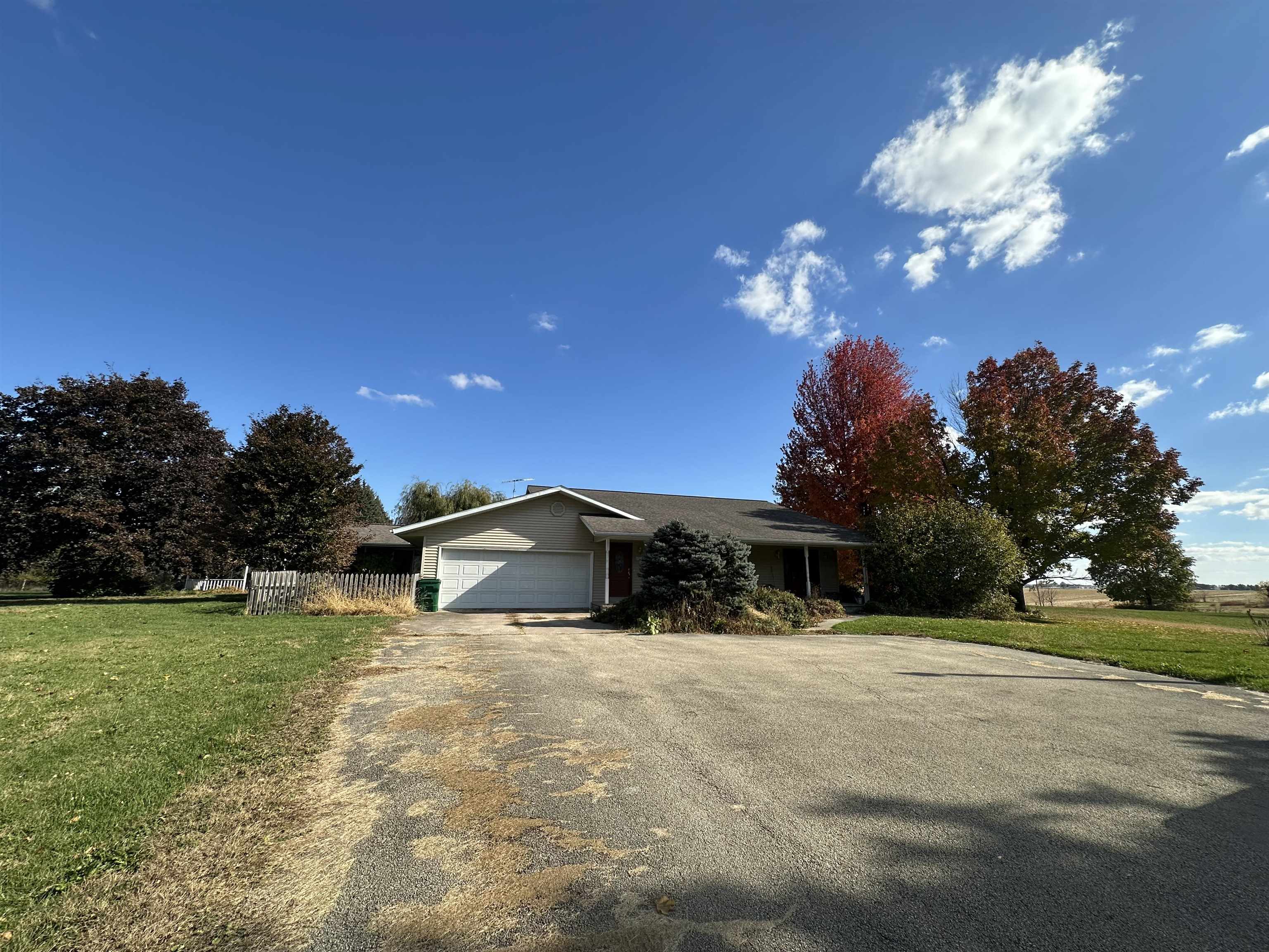 16529 Scenic Palisades Road Mount Carroll, IL 61053 - Photo 3 of 39 a view of a house with a yard yard and a garage