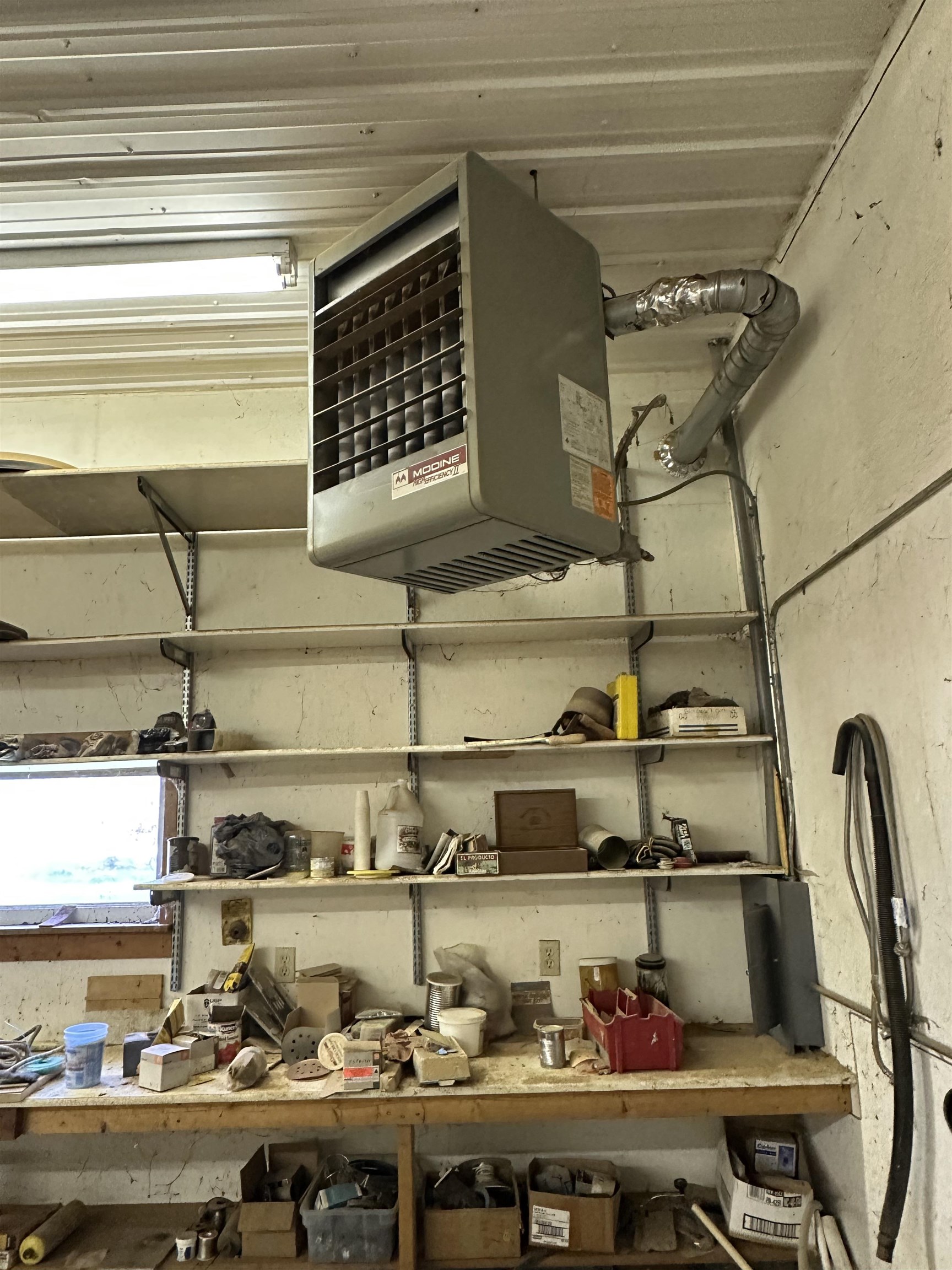 16529 Scenic Palisades Road Mount Carroll, IL 61053 - Photo 36 of 39 a room with lots of different colored cloths