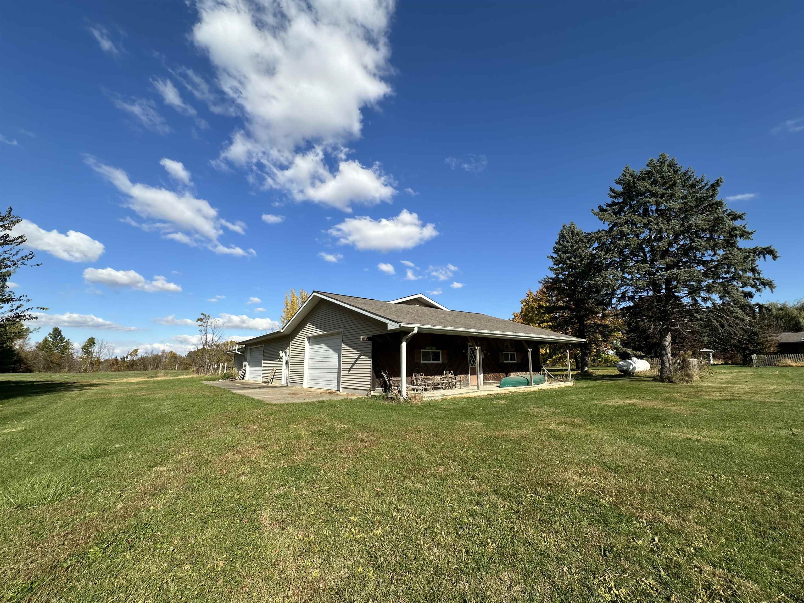16529 Scenic Palisades Road Mount Carroll, IL 61053 - Photo 4 of 39 a view of a house with a yard