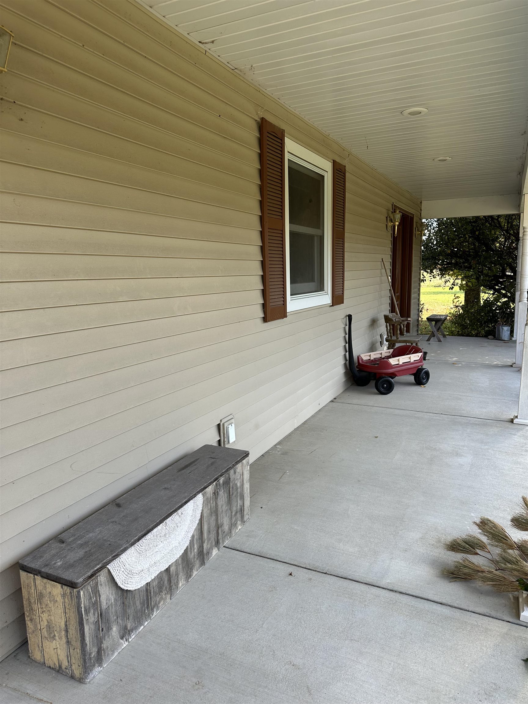 16529 Scenic Palisades Road Mount Carroll, IL 61053 - Photo 6 of 39 a view of a patio with table and chairs and potted plants