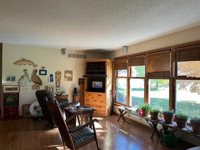 a room with gym equipment and a large window