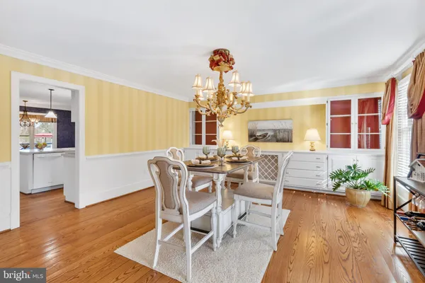 a spacious bedroom with a bed and a large window