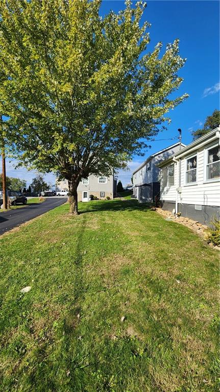 525 Burns Street Vandergrift, PA 15690 - Photo 21 of 25 a view of a house with a big yard