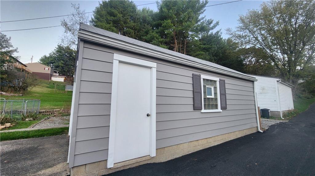 525 Burns Street Vandergrift, PA 15690 - Photo 25 of 25 a side view of a house with a yard