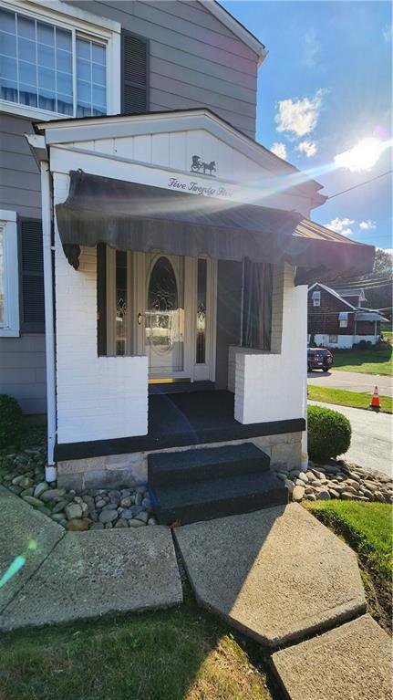 525 Burns Street Vandergrift, PA 15690 - Photo 3 of 25 a view of a house with a yard