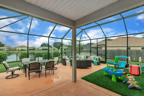 a view of an outdoor dining space with furniture