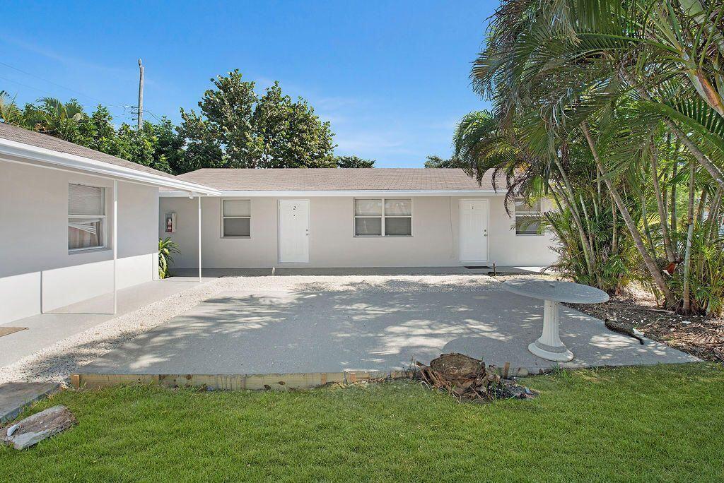 1883 Smith Drive, Unit 2 Juno Ridge, FL 33408 - Photo 1 of 5 smith 1