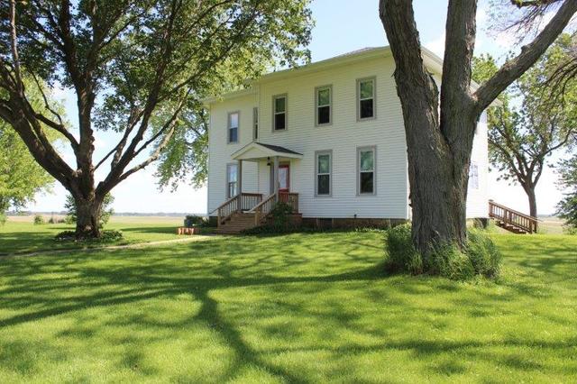19567 Mathew Road Morrison, IL 61270 - Photo 2 of 62 a front view of a house with a yard