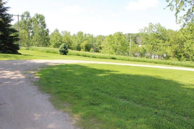 19567 Mathew Road Morrison, IL 61270 - Photo 11 of 62 a view of field with trees in the background