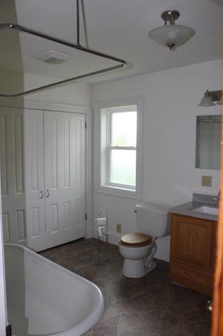 19567 Mathew Road Morrison, IL 61270 - Photo 24 of 62 a bathroom with a toilet and a sink