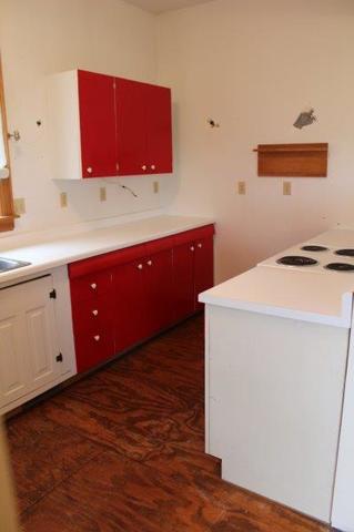 19567 Mathew Road Morrison, IL 61270 - Photo 41 of 62 a kitchen with a sink cabinets and wooden floor