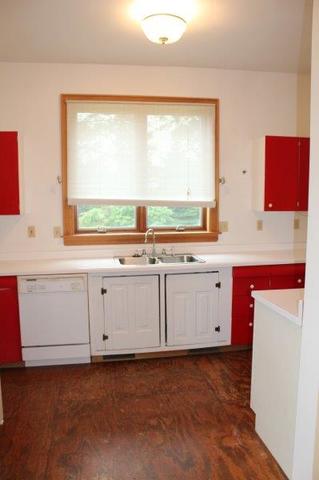19567 Mathew Road Morrison, IL 61270 - Photo 43 of 62 a view of a kitchen with wooden floor and electronic appliances