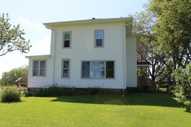 19567 Mathew Road Morrison, IL 61270 - Photo 6 of 62 a front view of a house with garden