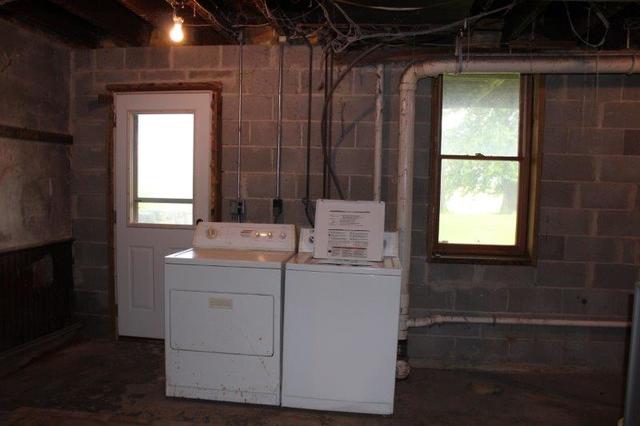 19567 Mathew Road Morrison, IL 61270 - Photo 53 of 62 a bathroom with a sink a mirror and next to a window