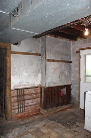 19567 Mathew Road Morrison, IL 61270 - Photo 54 of 62 a room with fireplace and a wooden cabinets