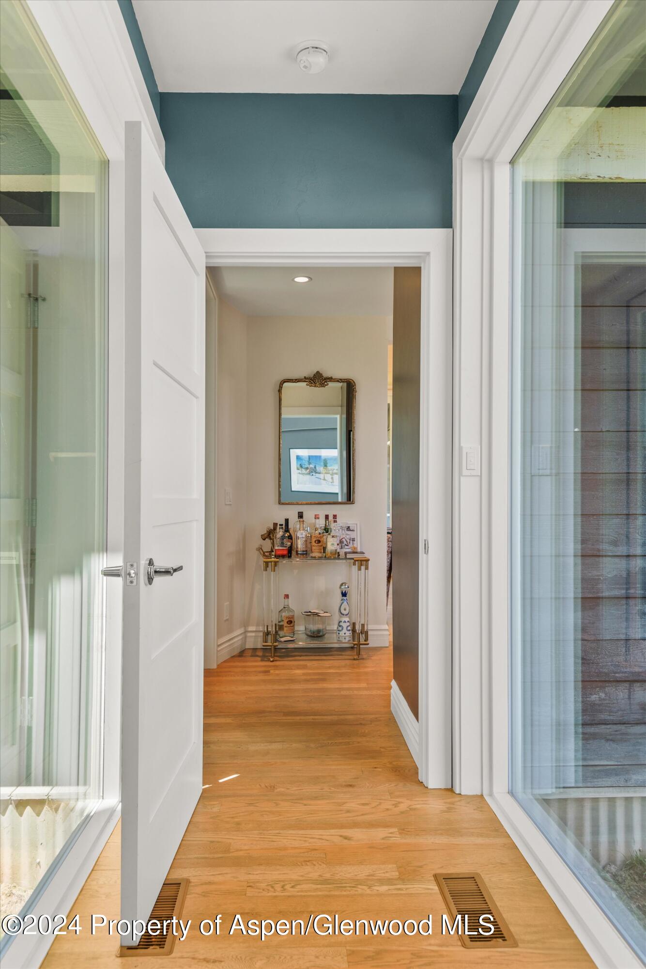 91 Alexander Avenue Snowmass, CO 81654 - Photo 15 of 32 a view of a bedroom from a hallway