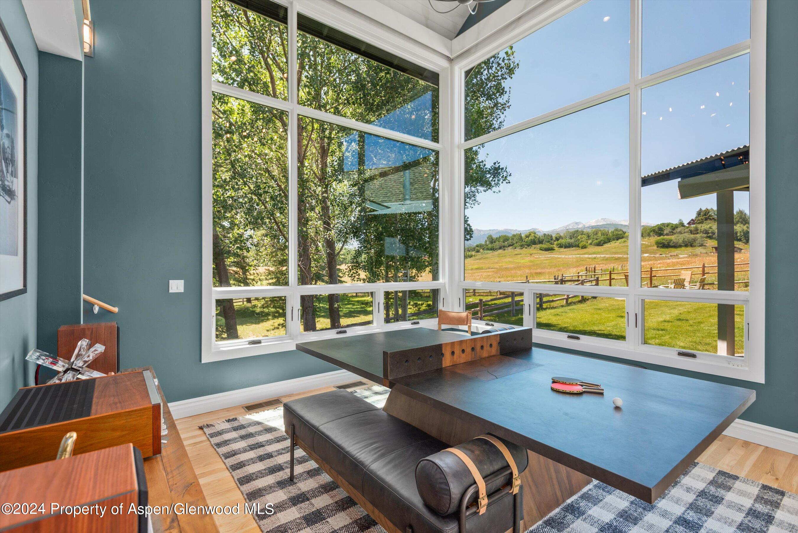 91 Alexander Avenue Snowmass, CO 81654 - Photo 16 of 32 a room with furniture and a window