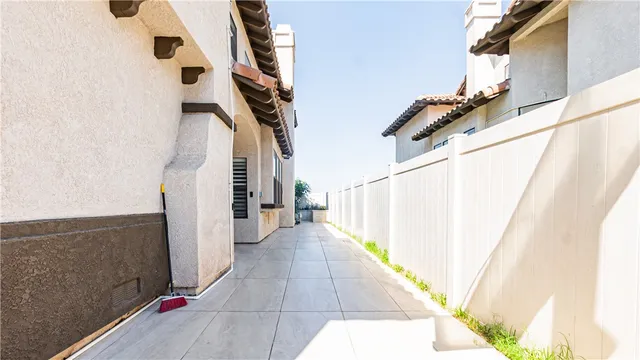 a bathroom with double vanity sink a mirror and a window