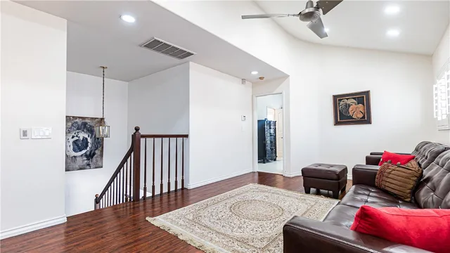 a bathroom with a double vanity sink a mirror and a shower