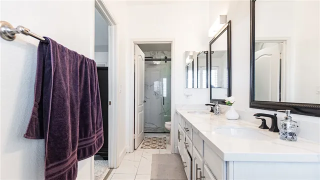 a view of a balcony with an outdoor seating