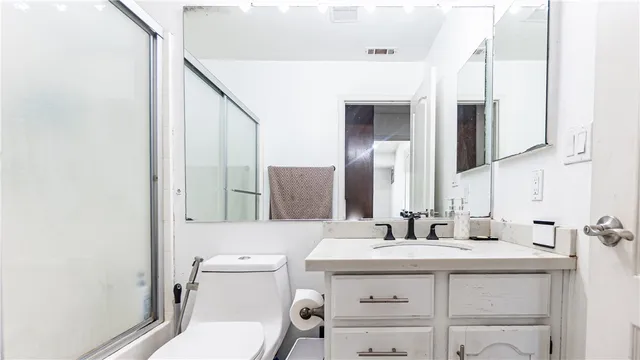 a view of house with a yard