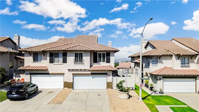 an aerial view of residential house and sandy dunes