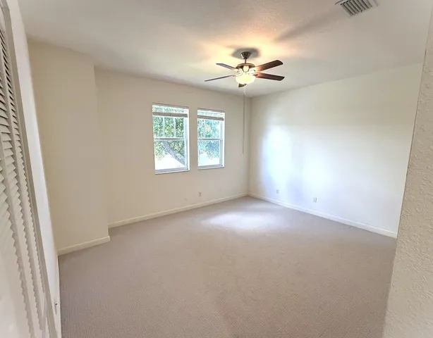 a view of a lake with a big yard