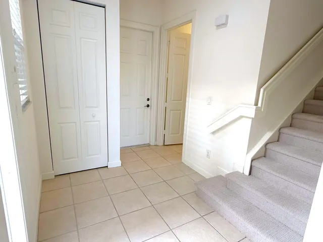 a view of entryway with wooden floor