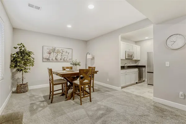 a view of a dining room with furniture