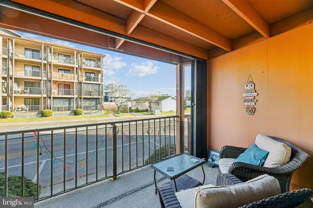 a balcony with furniture