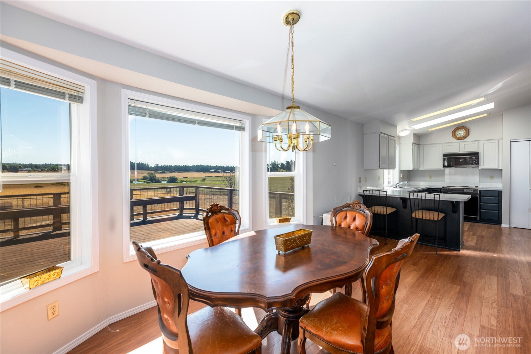 549 Davis Bay Road Lopez Island, WA 98261 - Photo 14 of 37 a view of a dining room with furniture window and outside view