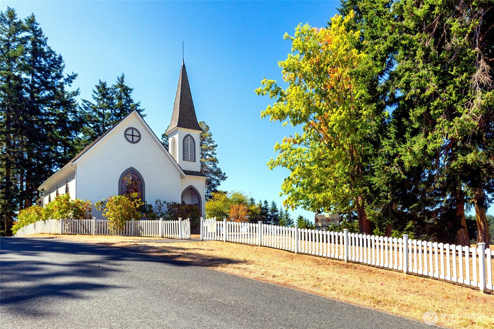 549 Davis Bay Road Lopez Island, WA 98261 - Photo 33 of 37 a view of a house with a yard and plants