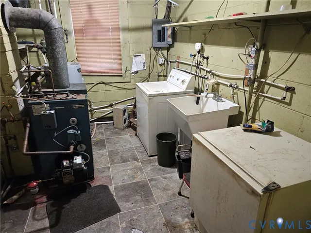 a view of a small yard with wooden fence