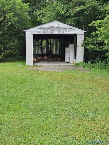 a view of a garden with a fountain