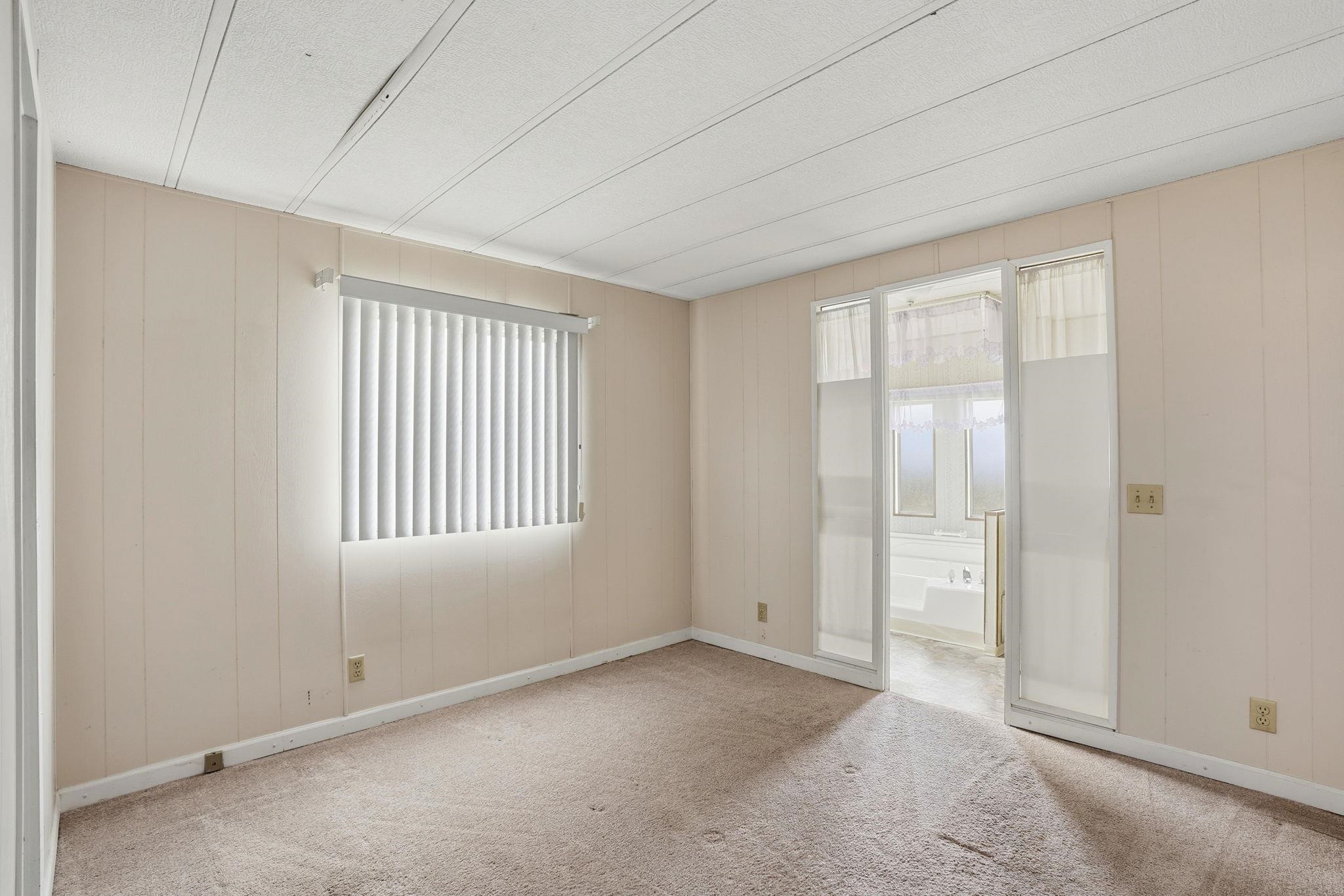 4603 Balfour Road, Unit 12 Brentwood, CA 94513 - Photo 16 of 36 an empty room with windows