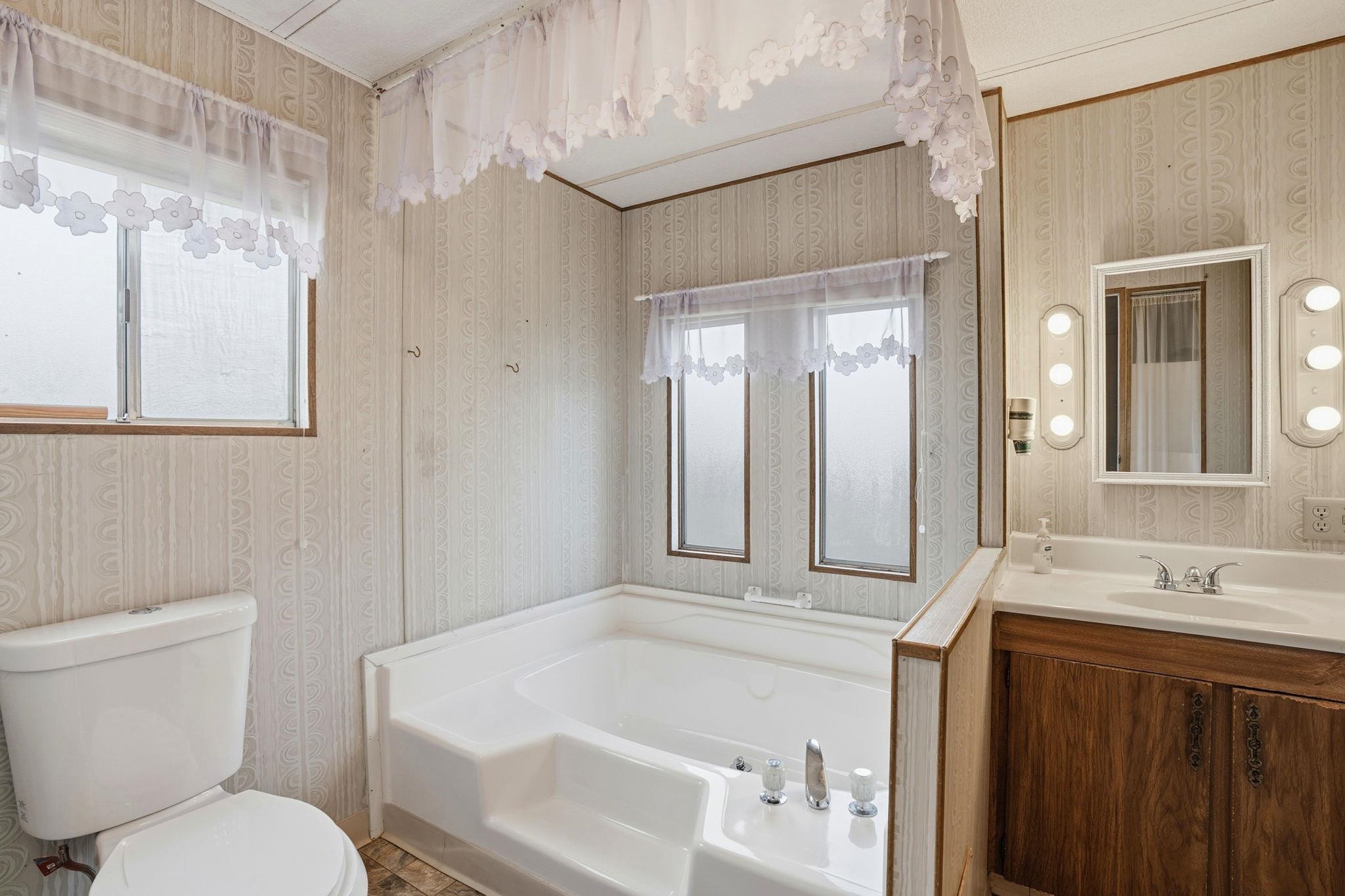 4603 Balfour Road, Unit 12 Brentwood, CA 94513 - Photo 21 of 36 a bathroom with a sink toilet and shower