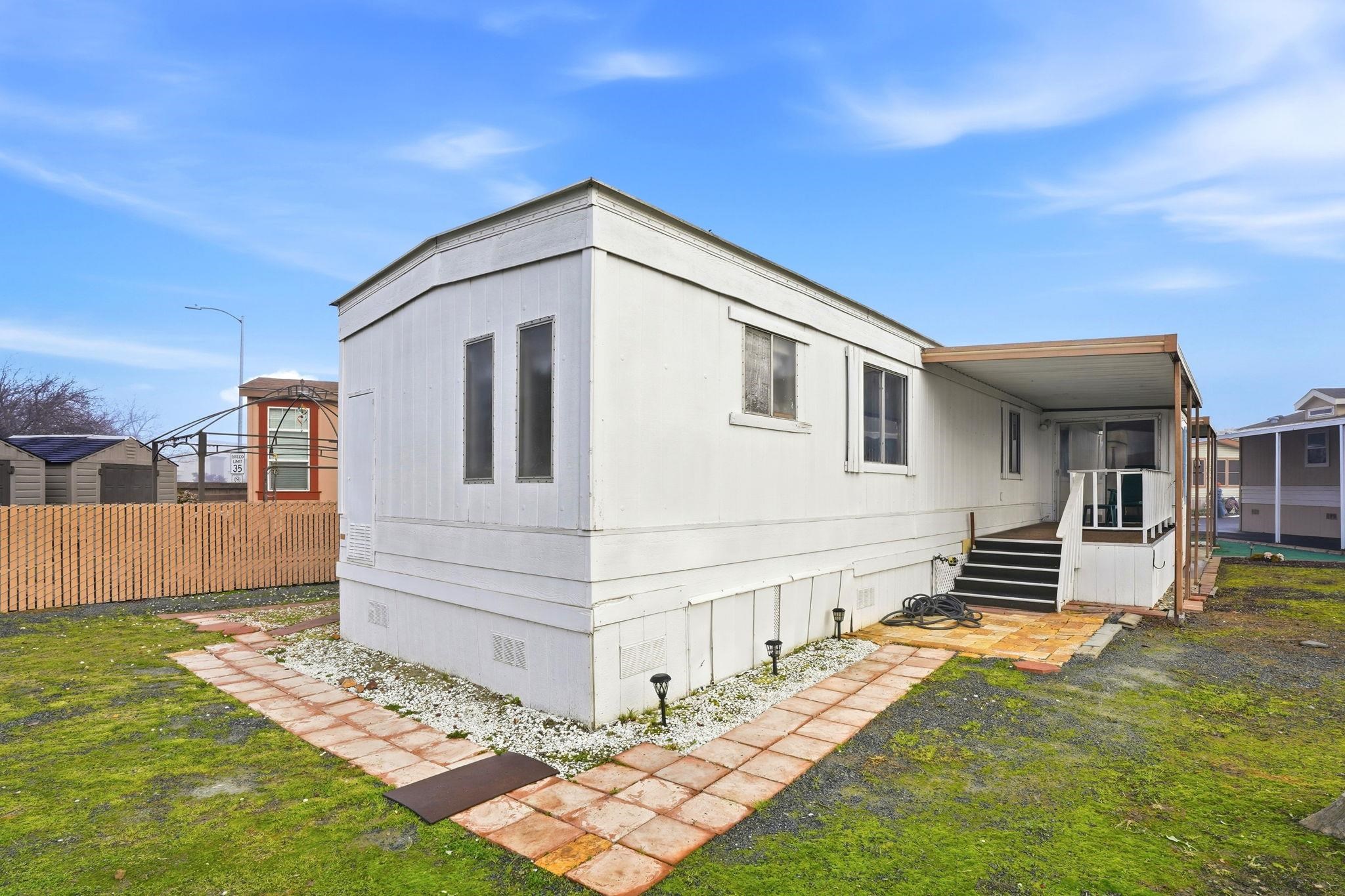 4603 Balfour Road, Unit 12 Brentwood, CA 94513 - Photo 27 of 36 a front view of a house with garden