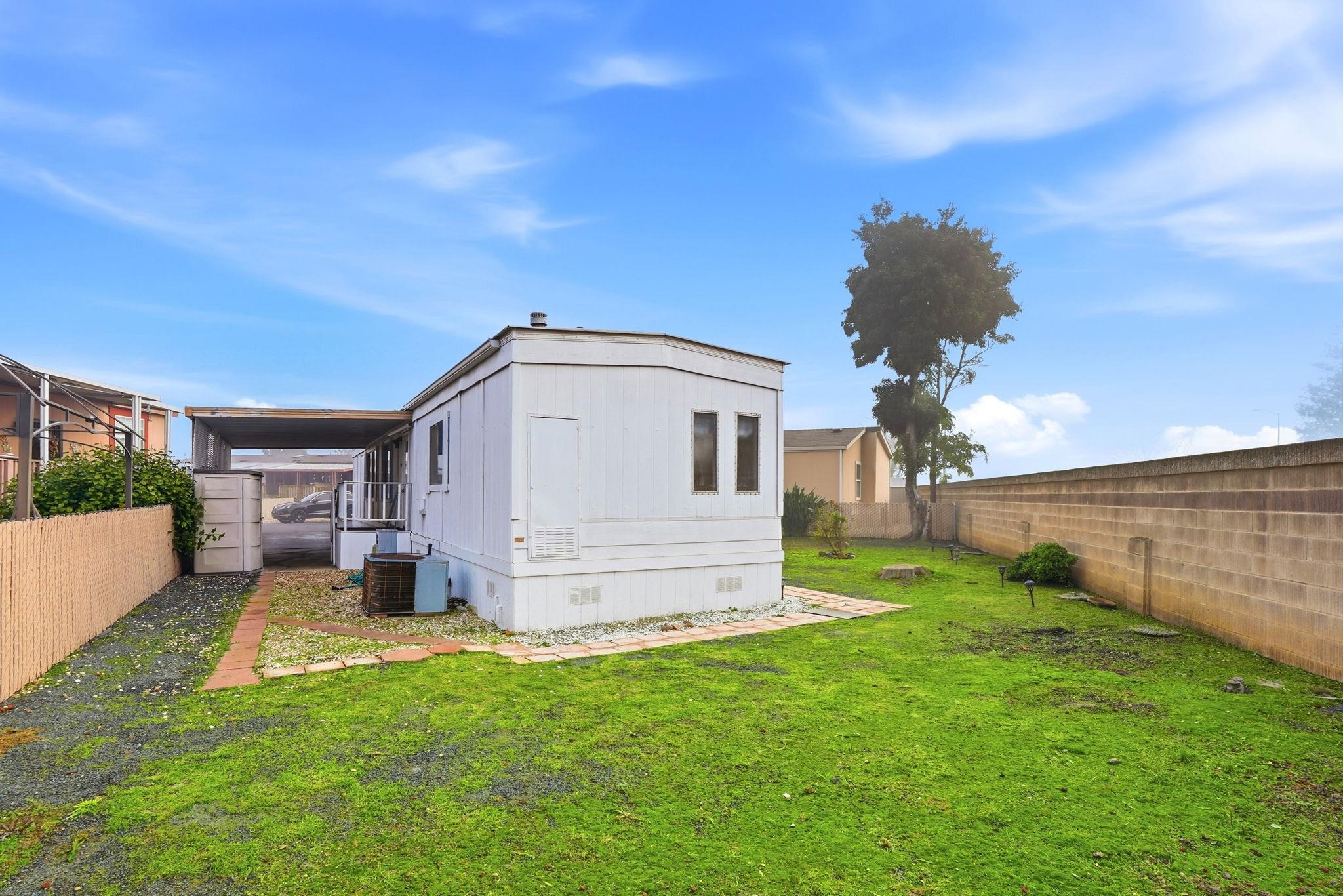 4603 Balfour Road, Unit 12 Brentwood, CA 94513 - Photo 28 of 36 a view of a back yard of the house