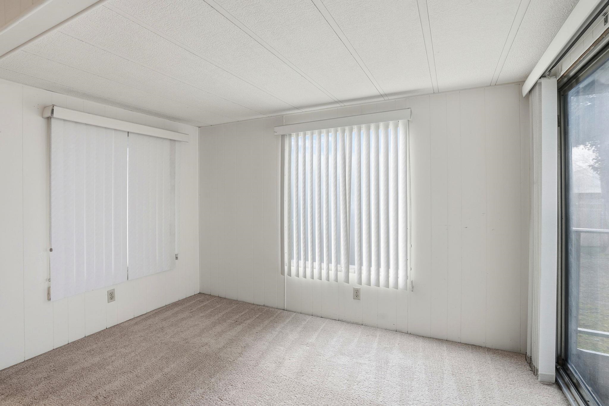 4603 Balfour Road, Unit 12 Brentwood, CA 94513 - Photo 8 of 36 an empty room with windows
