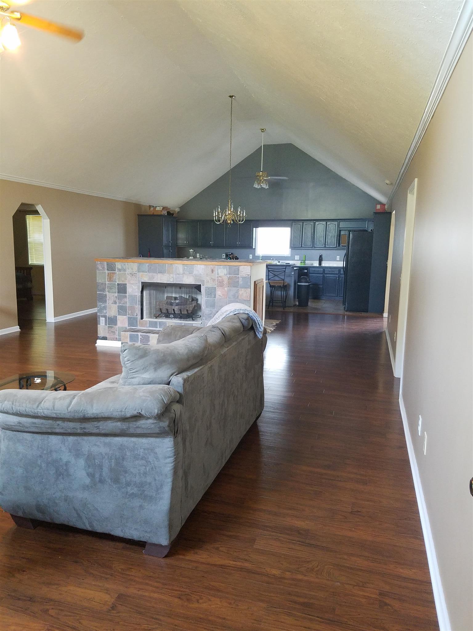 337 Brandon Road Manchester, TN 37355 - Photo 9 of 16 a living room with furniture and a wooden floor