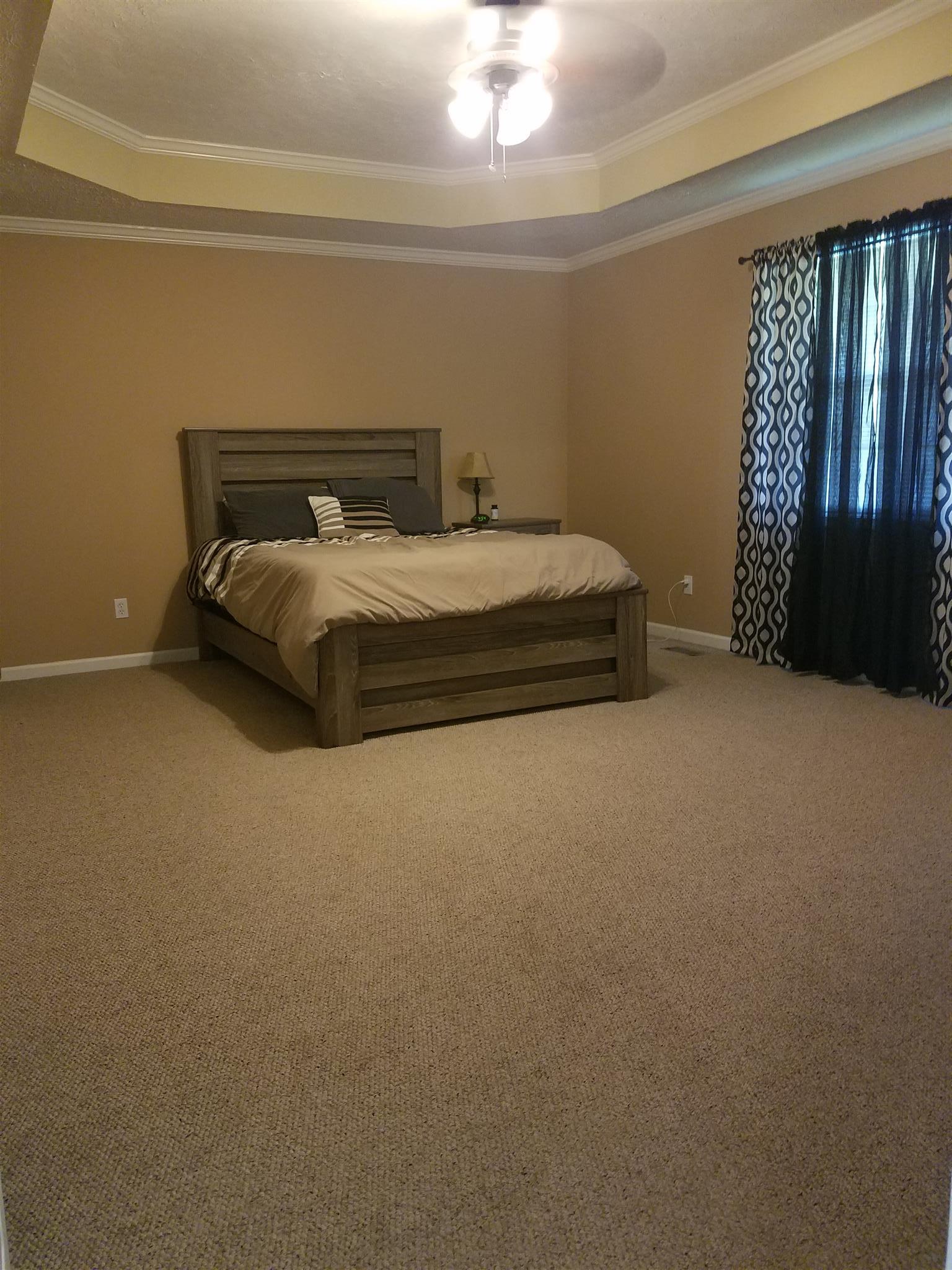 337 Brandon Road Manchester, TN 37355 - Photo 12 of 16 a bedroom with a bed and window