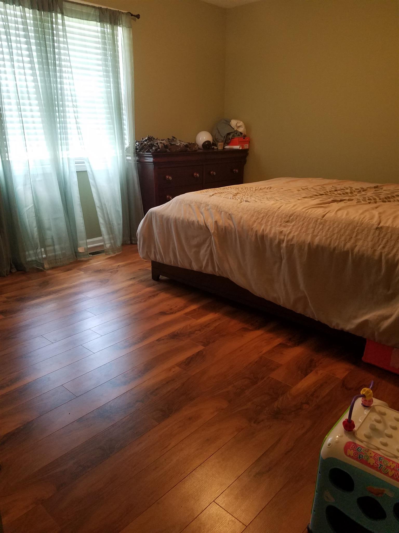 337 Brandon Road Manchester, TN 37355 - Photo 3 of 16 a bedroom with a bed and a window