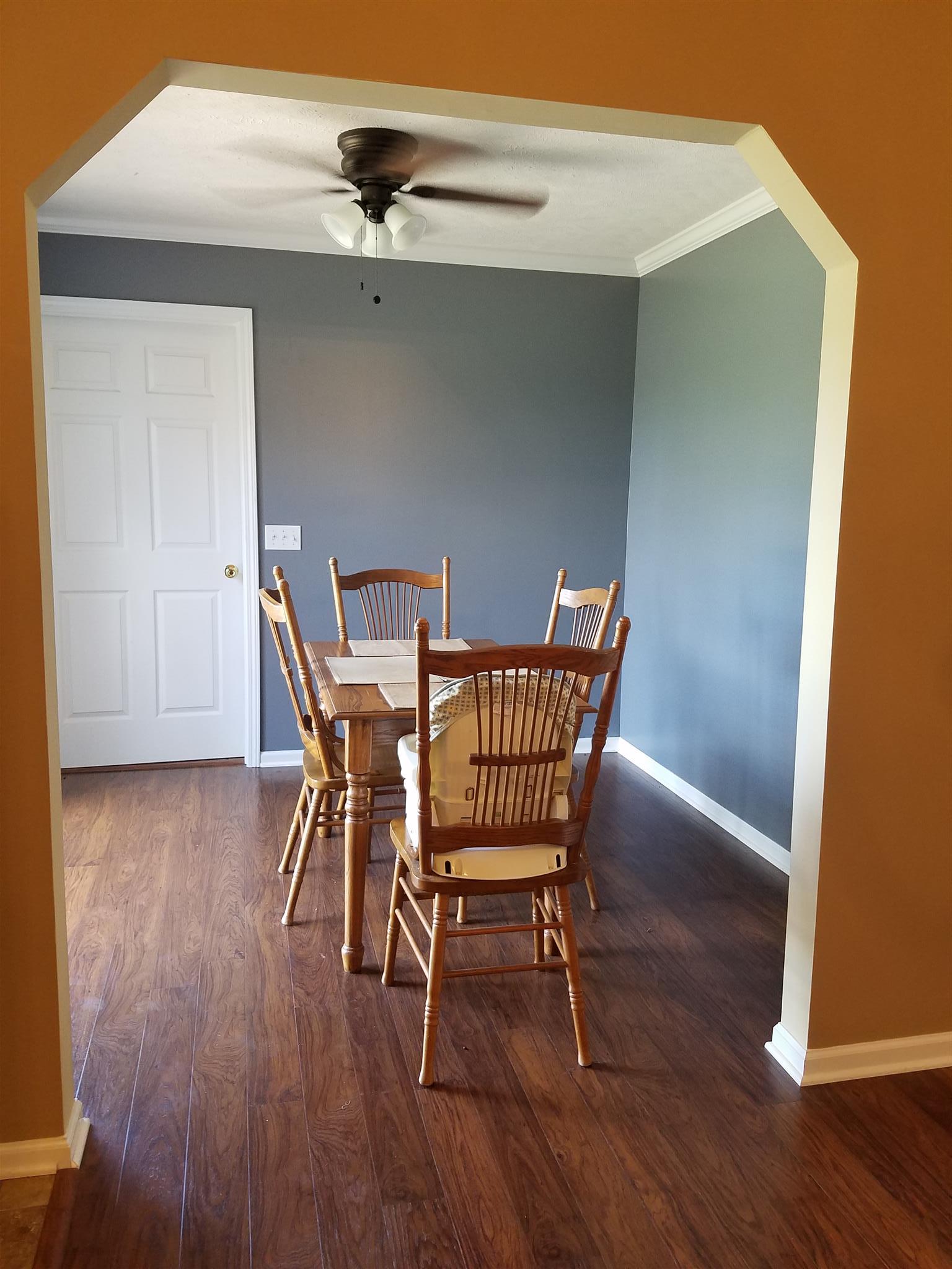 337 Brandon Road Manchester, TN 37355 - Photo 6 of 16 a view of a dining room with furniture and wooden floor
