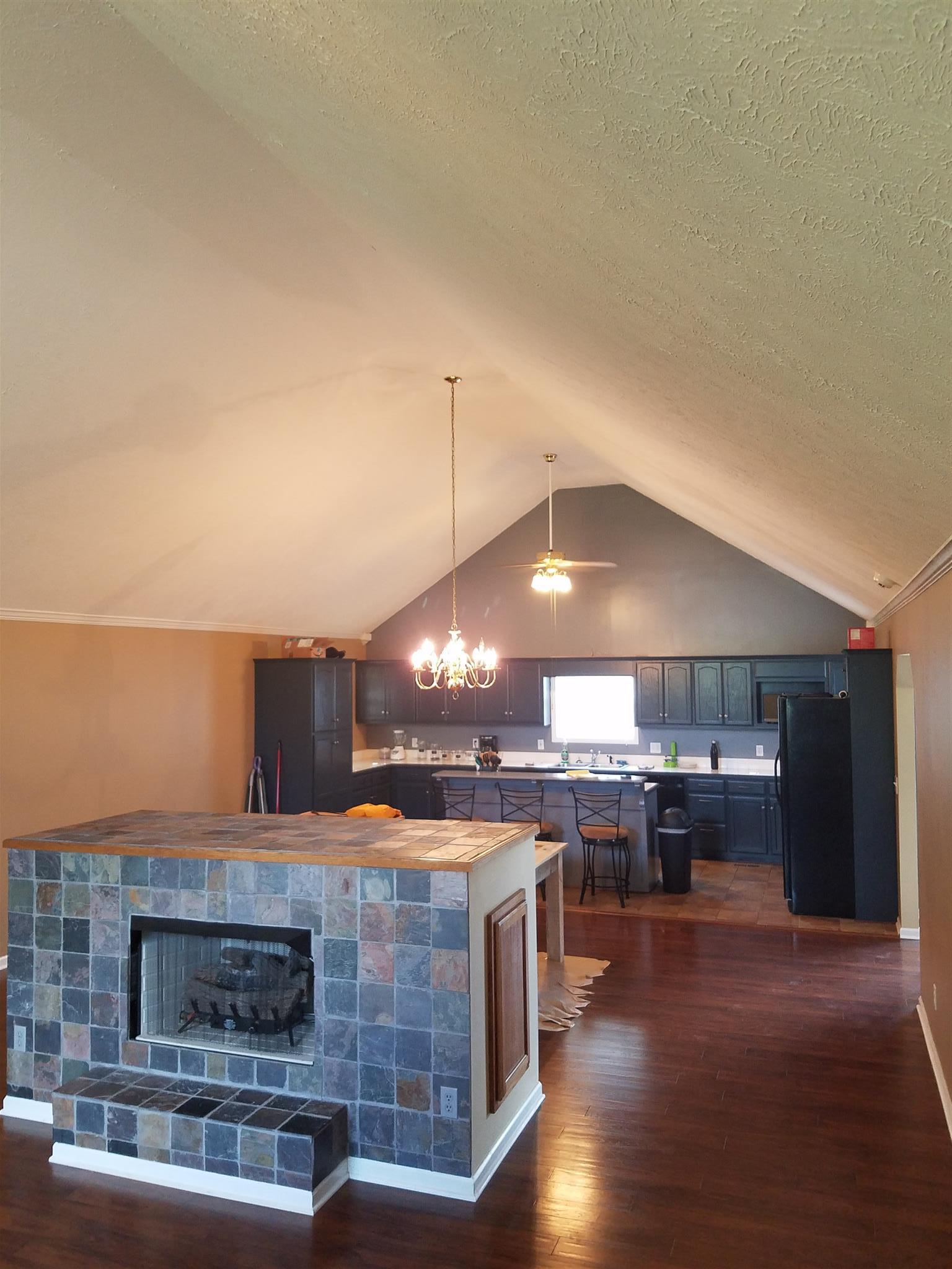 337 Brandon Road Manchester, TN 37355 - Photo 16 of 16 a large kitchen with a table and chairs