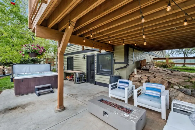 a view of backyard with seating space