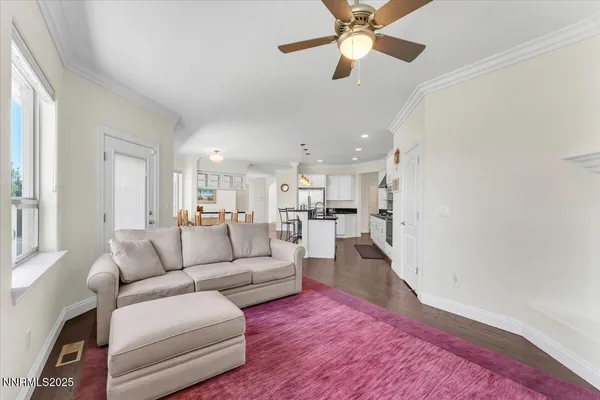 a spacious bedroom with a bed and a couch
