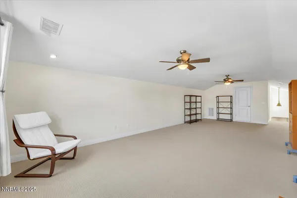 a kitchen with stainless steel appliances granite countertop a refrigerator and stove