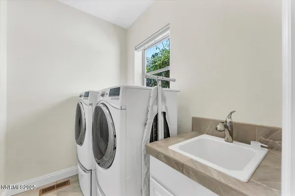 a view of swimming pool with a patio